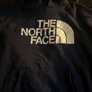 The North Face navy blue pull over.